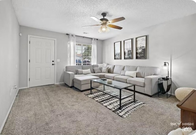 1500 Linwood Cir, Bentonville, AR 72712 - carpeted living room with a textured ceiling, ceiling fan, and baseboards