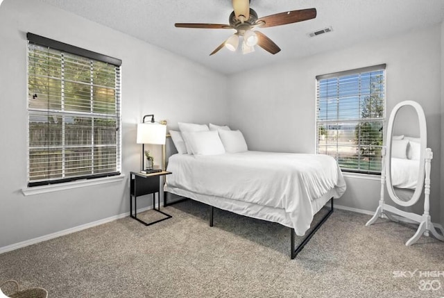 1500 Linwood Cir, Bentonville, AR 72712 - bedroom with carpet, baseboards, and a ceiling fan