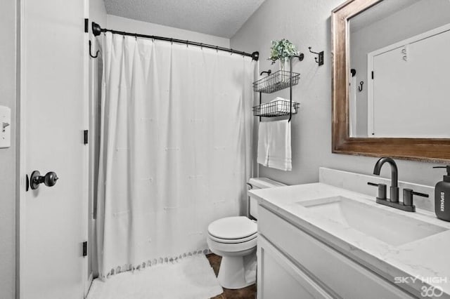 1500 Linwood Cir, Bentonville, AR 72712 - full bath with a textured ceiling, vanity, toilet, and a shower with shower curtain