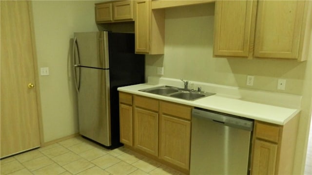 103-105 Dakota Trl, Farmington, AR 72730 - kitchen with stainless steel appliances, a sink, light countertops, and light tile patterned flooring