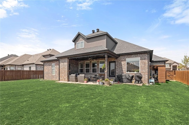 120 Bequette Ln, Centerton, AR 72719 - back of property with outdoor lounge area, a patio, brick siding, and roof with shingles