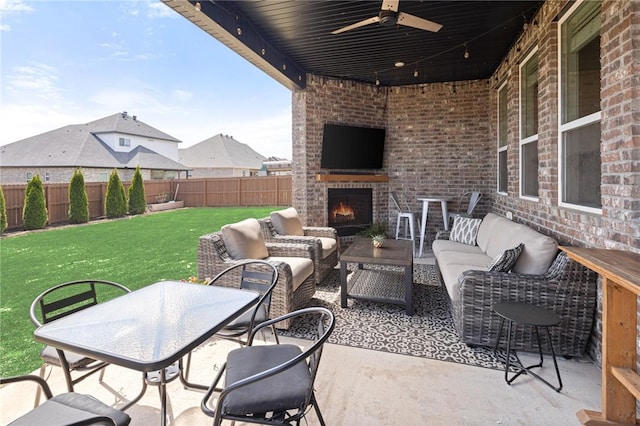 120 Bequette Ln, Centerton, AR 72719 - view of patio / terrace featuring an outdoor living space with a fireplace and a ceiling fan
