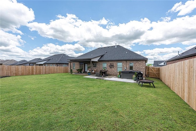 852 Round Top St, Prairie Grove, AR 72753 - back of property with a patio, a shingled roof, and brick siding