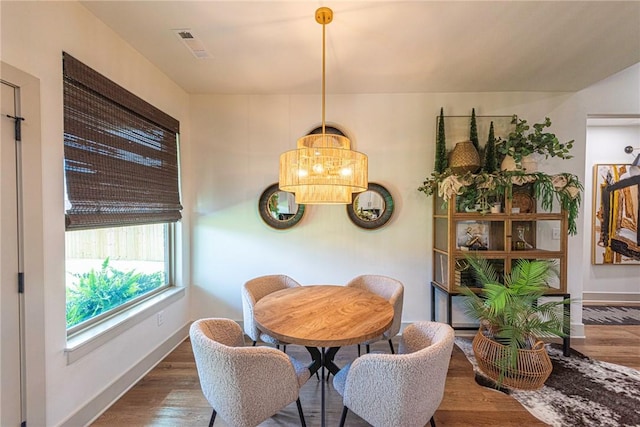 852 Round Top St, Prairie Grove, AR 72753 - dining space with wood finished floors and baseboards