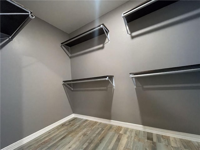 2103 Highland Ct, Dardanelle, AR 72834 - spacious closet featuring wood finished floors