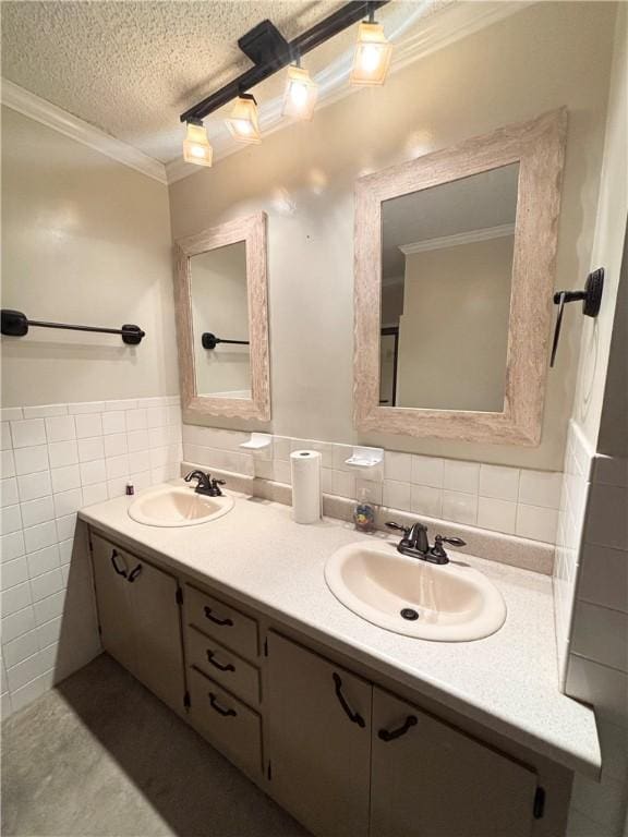 1010 Sherman Ave, Harrison, AR 72601 - full bathroom with tile walls, ornamental molding, double vanity, wainscoting, and a textured ceiling