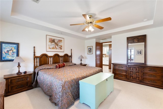 33 Holiday Island Dr, Holiday Island, AR 72631 - bedroom with a raised ceiling, light colored carpet, and a ceiling fan