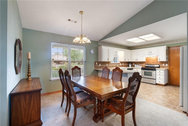 33 Holiday Island Dr, Holiday Island, AR 72631 - dining room with a chandelier, lofted ceiling, light carpet, and baseboards