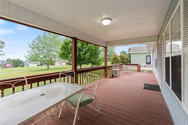 33 Holiday Island Dr, Holiday Island, AR 72631 - wooden deck with outdoor dining area and a yard