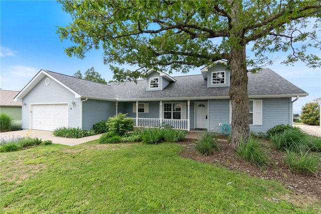 33 Holiday Island Dr, Holiday Island, AR 72631 - view of front facade featuring covered porch, a front yard, an attached garage, and roof with shingles