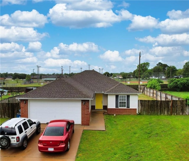 509 SW Persimmon St, Gravette, AR 72736 - single story home featuring brick siding, a garage, concrete driveway, and roof with shingles