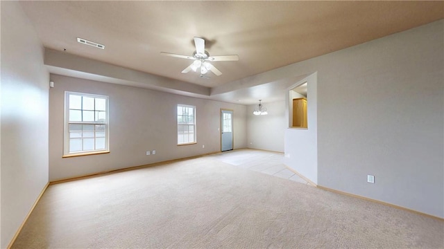 509 SW Persimmon St, Gravette, AR 72736 - unfurnished room featuring ceiling fan, light colored carpet, baseboards, and a chandelier