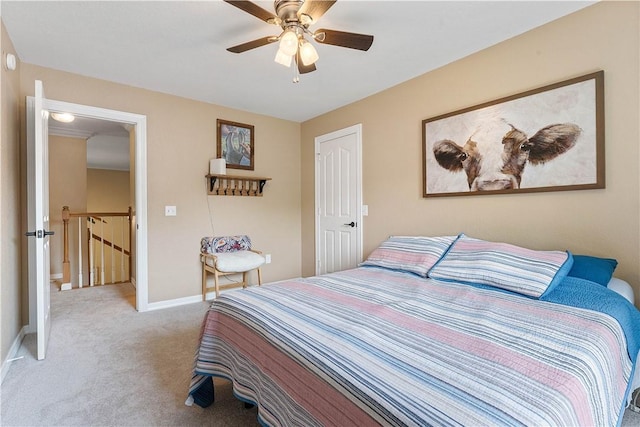 4730 Woodside Ln, Springdale, AR 72762 - bedroom featuring light colored carpet, baseboards, and a ceiling fan