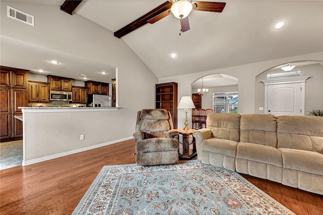 1805 SW Birch St, Bentonville, AR 72713 - living room with arched walkways, ceiling fan, recessed lighting, light wood-style floors, and baseboards