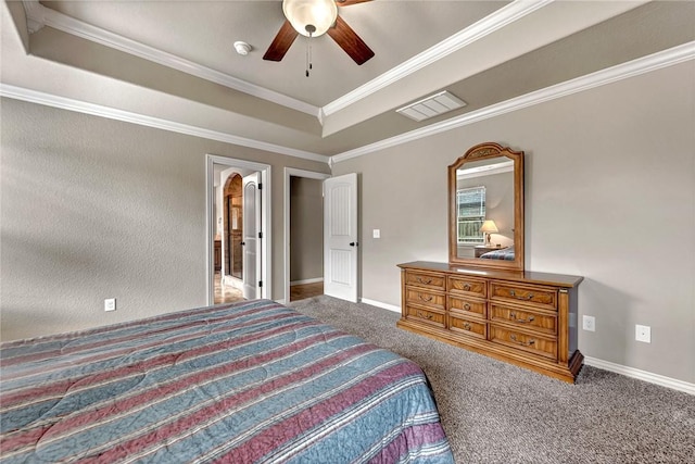 1805 SW Birch St, Bentonville, AR 72713 - carpeted bedroom featuring a raised ceiling, crown molding, a ceiling fan, and baseboards