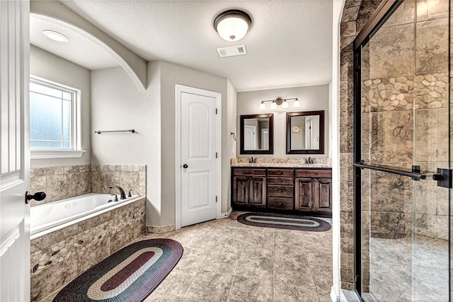1805 SW Birch St, Bentonville, AR 72713 - bathroom with a shower stall, a bath, and double vanity