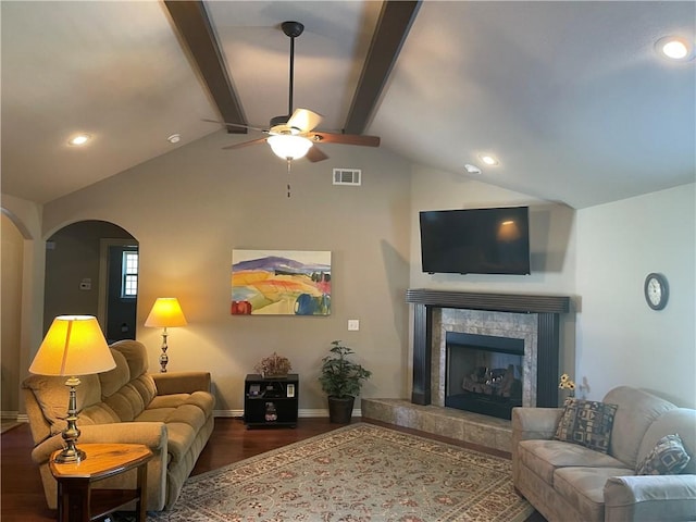 1805 SW Birch St, Bentonville, AR 72713 - living area featuring wood finished floors, ceiling fan, arched walkways, a fireplace, and baseboards