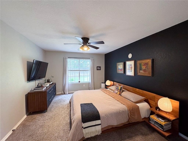 4408 W Apache Trl, Fayetteville, AR 72704 - bedroom with light colored carpet, baseboards, ceiling fan, and a textured ceiling