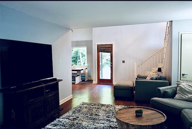 1211 N Mission Blvd, Fayetteville, AR 72701 - living area with stairway and dark wood-style flooring
