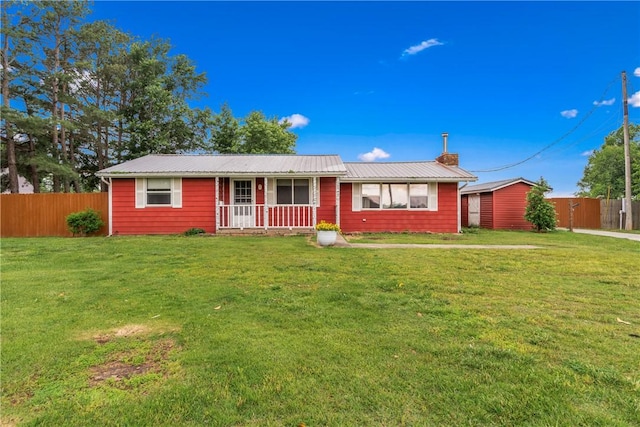 12549 Little Elm Rd, Farmington, AR 72730 - ranch-style home featuring a porch and metal roof
