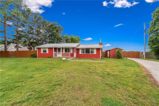 12549 Little Elm Rd, Farmington, AR 72730 - ranch-style home with a porch, metal roof, and driveway