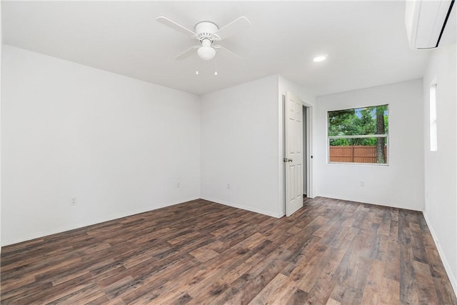 12549 Little Elm Rd, Farmington, AR 72730 - spare room featuring wood finished floors, a ceiling fan, recessed lighting, baseboards, and a wall unit AC