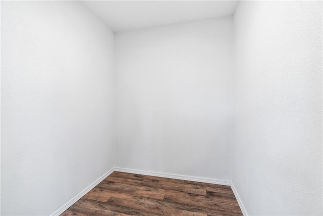 12549 Little Elm Rd, Farmington, AR 72730 - unfurnished room with dark wood-type flooring and baseboards