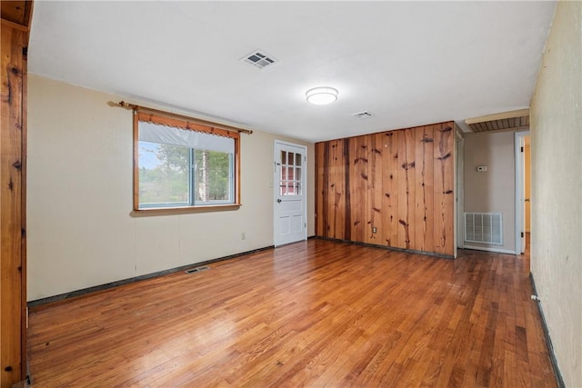 12549 Little Elm Rd, Farmington, AR 72730 - unfurnished bedroom with wood finished floors