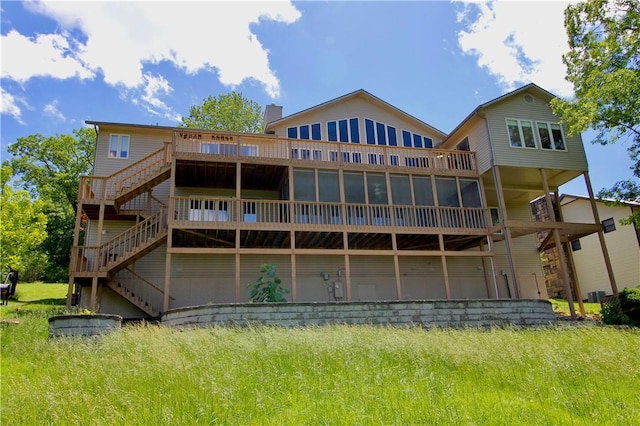 70 Shields Spur, Holiday Island, AR 72631 - back of house with stairway, a deck, and a chimney