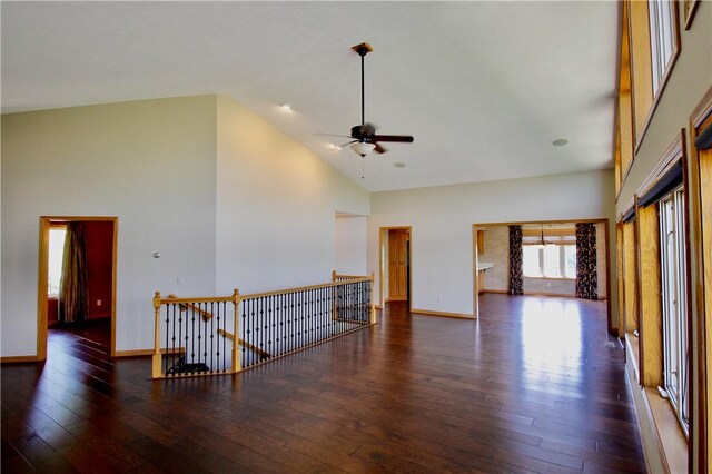70 Shields Spur, Holiday Island, AR 72631 - unfurnished room featuring high vaulted ceiling, hardwood / wood-style flooring, ceiling fan, and baseboards