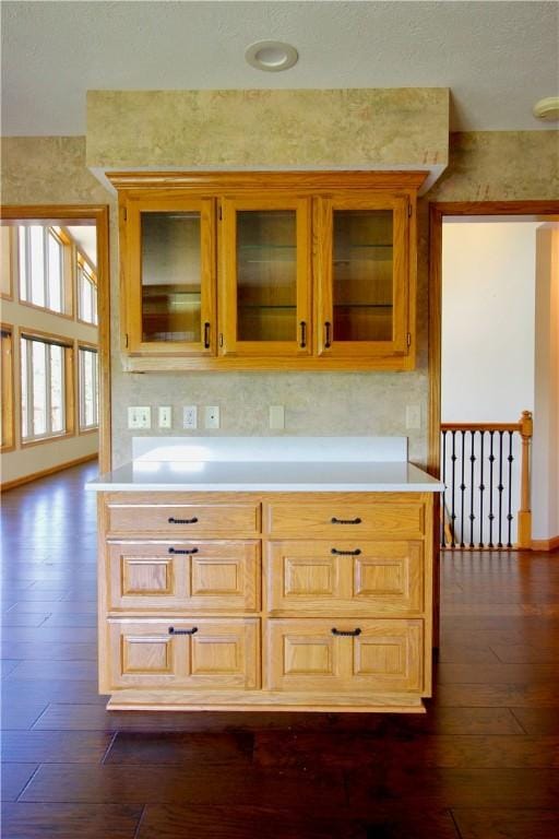 70 Shields Spur, Holiday Island, AR 72631 - kitchen with light countertops, dark wood-style flooring, and glass insert cabinets