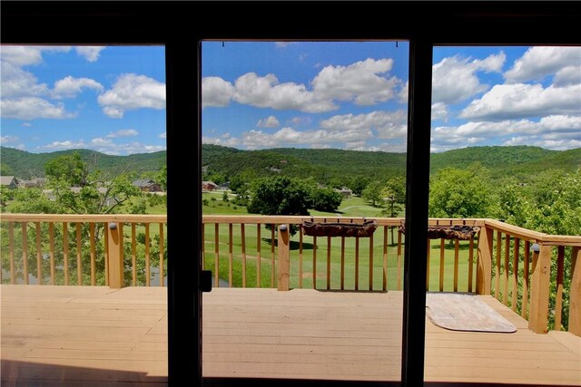 70 Shields Spur, Holiday Island, AR 72631 - deck featuring a mountain view, a view of trees, and a yard