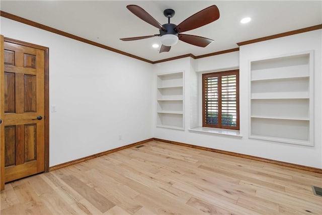1640 N Boston Pl, Fayetteville, AR 72703 - empty room with built in features, baseboards, wood finished floors, ornamental molding, and a ceiling fan