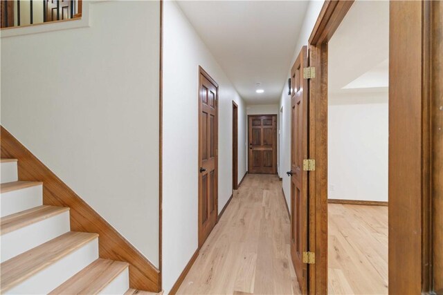 1640 N Boston Pl, Fayetteville, AR 72703 - hallway with light wood finished floors, recessed lighting, and stairs