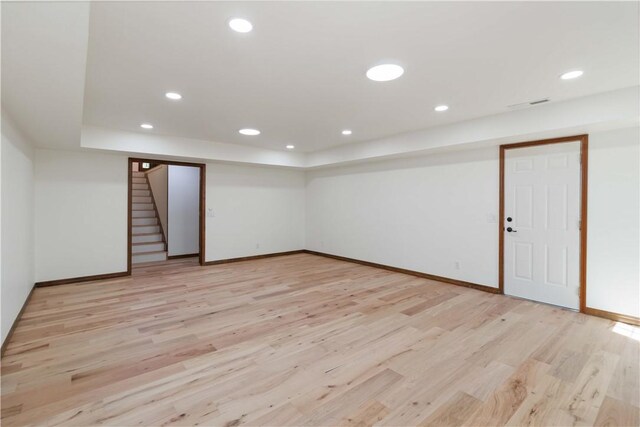 1640 N Boston Pl, Fayetteville, AR 72703 - finished below grade area with light wood-style floors, baseboards, stairs, and recessed lighting