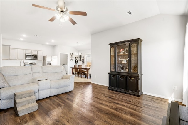 2405 Maplewood Ave, Lowell, AR 72745 - living room with a ceiling fan, dark wood-style floors, baseboards, a chandelier, and recessed lighting