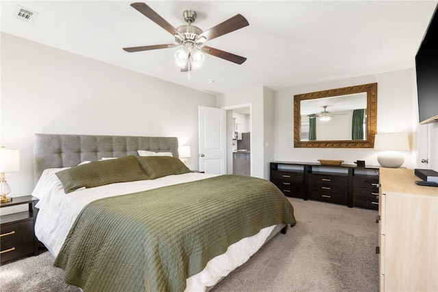 2405 Maplewood Ave, Lowell, AR 72745 - bedroom with light carpet and ceiling fan