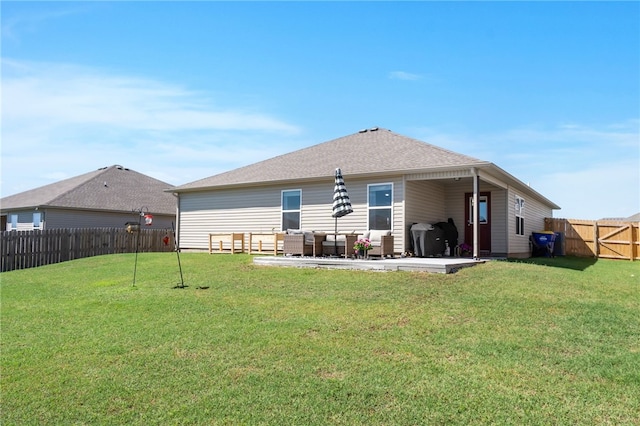 2405 Maplewood Ave, Lowell, AR 72745 - rear view of house featuring an outdoor living space and a patio