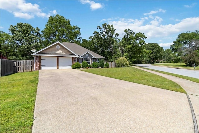 603 Highland Ct, Siloam Springs, AR 72761 - ranch-style home featuring driveway, an attached garage, brick siding, and view of scattered trees