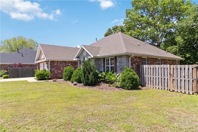 603 Highland Ct, Siloam Springs, AR 72761 - view of front of house featuring brick siding, an attached garage, and a shingled roof