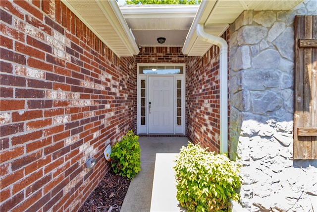 603 Highland Ct, Siloam Springs, AR 72761 - doorway to property with stone siding and brick siding