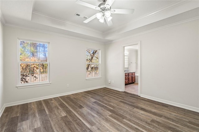 603 Highland Ct, Siloam Springs, AR 72761 - spare room with dark wood finished floors, a raised ceiling, ceiling fan, crown molding, and baseboards