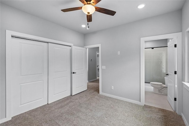 2 Brightling Ln, Bella Vista, AR 72715 - unfurnished bedroom featuring carpet flooring, a closet, ensuite bath, baseboards, and recessed lighting