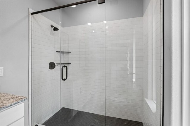 2 Brightling Ln, Bella Vista, AR 72715 - bathroom featuring a shower stall and vanity