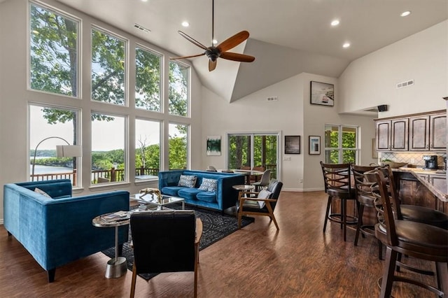 15100 Railroad Cut Rd, Rogers, AR 72756 - living room featuring recessed lighting, dark wood-style floors, baseboards, ceiling fan, and high vaulted ceiling