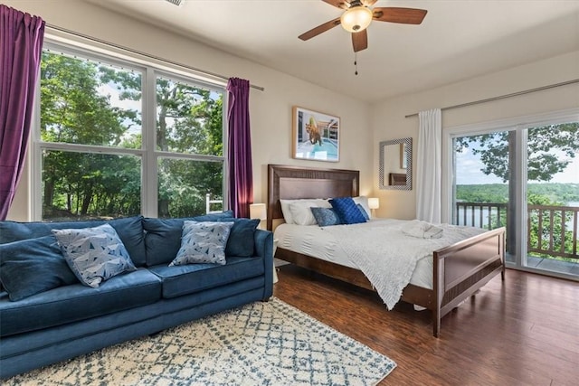 15100 Railroad Cut Rd, Rogers, AR 72756 - bedroom featuring multiple windows, wood finished floors, access to outside, and ceiling fan
