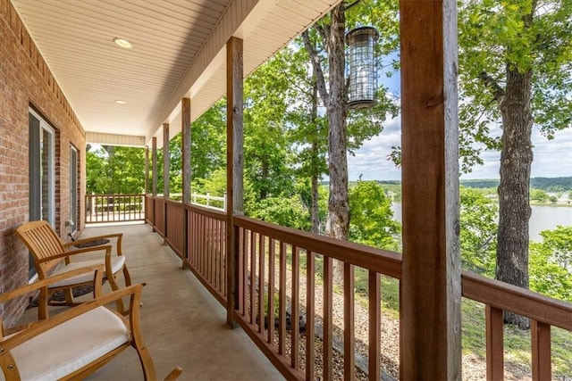 15100 Railroad Cut Rd, Rogers, AR 72756 - covered porch featuring a water view