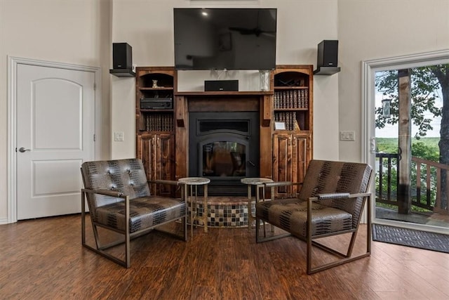15100 Railroad Cut Rd, Rogers, AR 72756 - sitting room featuring wood finished floors and a glass covered fireplace
