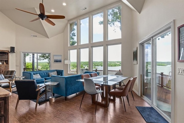 15100 Railroad Cut Rd, Rogers, AR 72756 - dining area featuring high vaulted ceiling, a water view, wood finished floors, plenty of natural light, and a ceiling fan