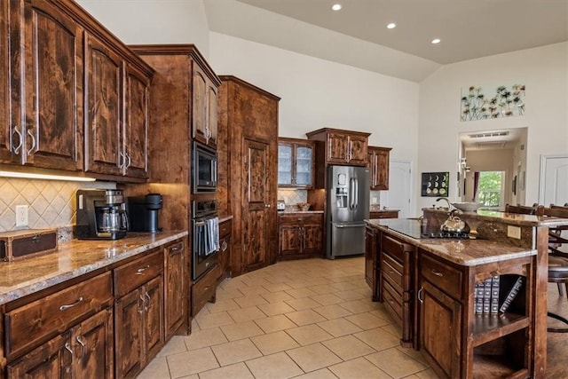 15100 Railroad Cut Rd, Rogers, AR 72756 - kitchen featuring appliances with stainless steel finishes, light stone counters, tasteful backsplash, light tile patterned floors, and open shelves